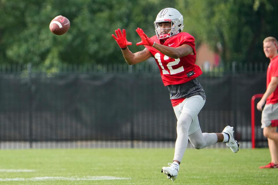 Caleb Burton catches a pass during the first fall practice at Ohio State last August. The former Del Valle and Lake Travis star transferred to Auburn in the offseason, and coach Hugh Freeze thinks he could have an immediate impact.