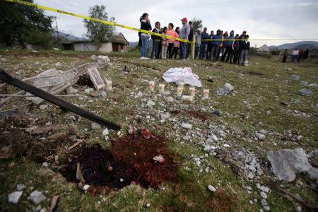 A blood stain is seen at the site of the explosion of a house where fireworks were stored in the town of San Isidro, Chilchotla, Mexico, May 9, 2017. REUTERS/Imelda Medina