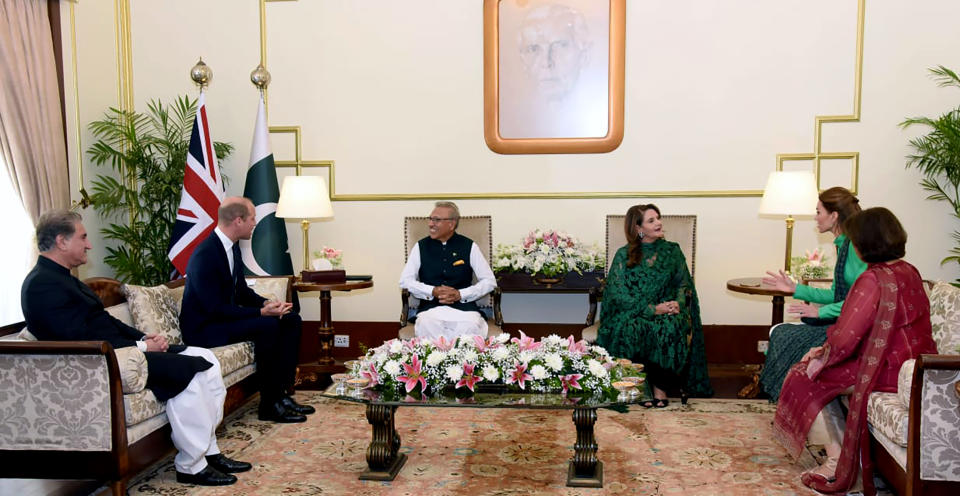 In this photo released by the ruling Pakistan Tehreek-e-Insaf party, visiting British Royal Couple Prince William, second left, and his wife Kate, second right, meet with Pakistan's President Arif Alvi, center left, and his wife, Samina Alvi, in Islamabad, Pakistan, Tuesday, Oct. 15, 2019. Britain's Prince William and his wife Kate kicked off a five-day tour of Pakistan on Tuesday, amid much fanfare and tight security. (Pakistan Tehreeke-e-Insaf Party via AP)