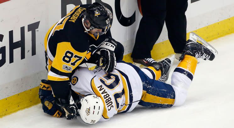 Pittsburgh Penguins’ Sidney Crosby (87) tangles with Nashville Predators’ P.K. Subban (76) during the first period in Game 5. (Gene J. Puskar/AP)