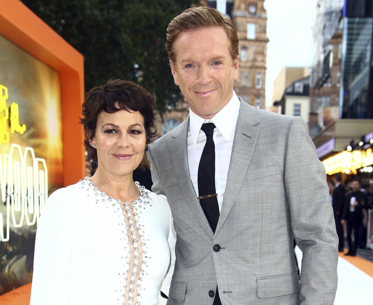 Actors Helen McCrory, left, and Damian Lewis pose for photographers upon arrival at the UK premiere for Once Upon A Time in Hollywood, at a central London cinema, Tuesday, July 30, 2019. 