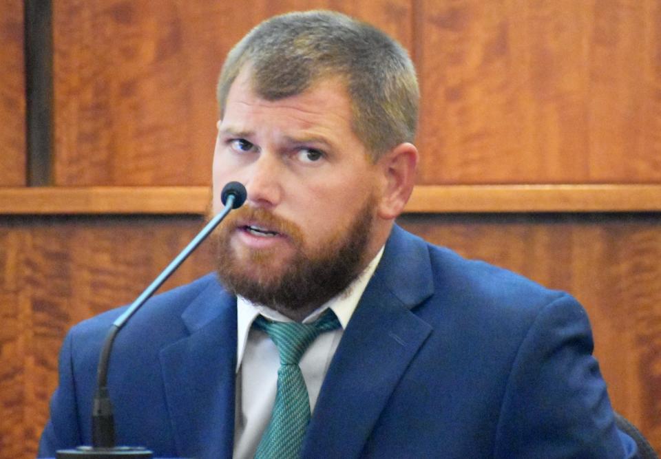 Former Fall River police officer Thomas Roberts testifies in court Monday, during the trial of former officer Michael Pessoa.