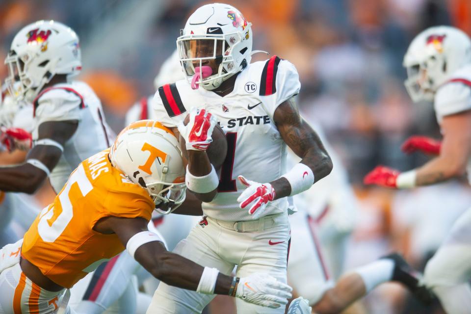 Ball State cornerback Nic Jones (1) is tackled by Tennessee defensive back Jourdan Thomas (25) during football game between Tennessee and Ball State at Neyland Stadium in Knoxville, Tenn. on Thursday, Sept. 1, 2022.