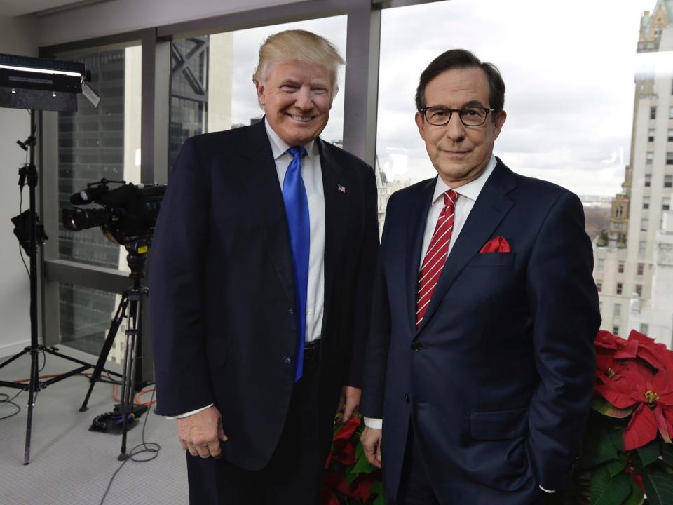 Donald Trump poses for a photo with Chris Wallace before his interview for 