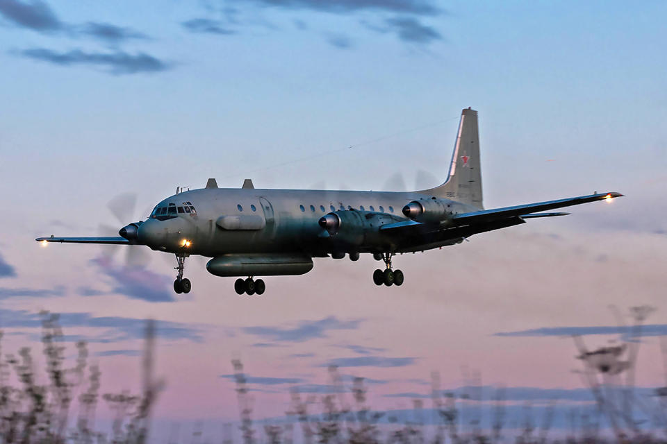 A photo taken on July 23, 2006 shows an Russian IL-20M (Ilyushin 20m) plane landing at an unknown location. - Russia blamed Israel on September 18, 2018 for the loss of a military IL-20M jet to Syrian fire, which killed all 15 servicemen on board, and threatened a response. Israeli pilots carrying out attacks on Syrian targets 