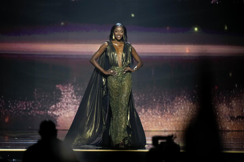 Miss Trinidad and Tobago Tya Jane Ramey takes part in the evening gown competition during the final round of the 71st Miss Universe Beauty Pageant in New Orleans, Saturday, Jan. 14, 2023. (AP Photo/Gerald Herbert)