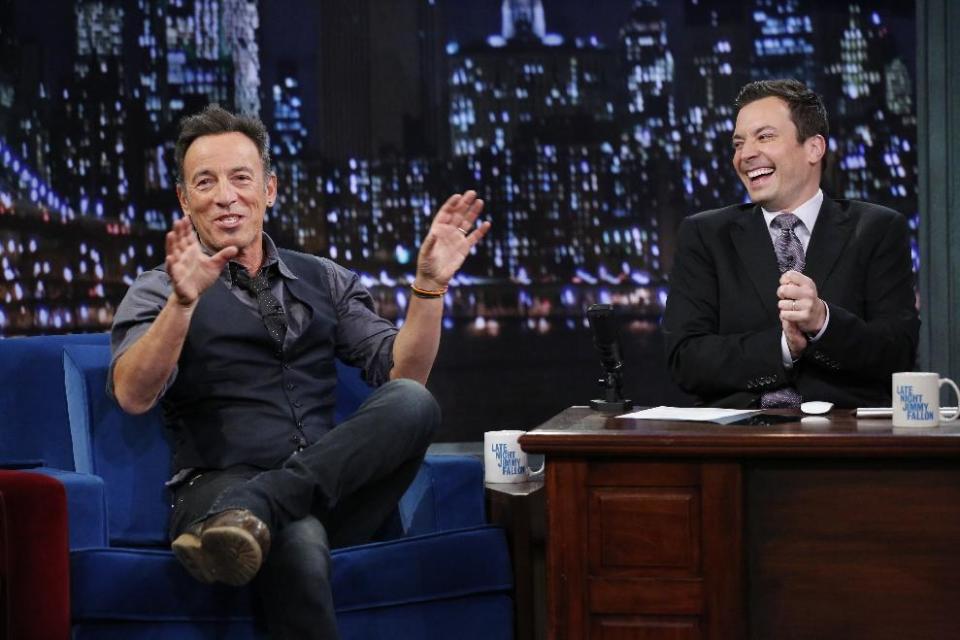 This image released by NBC shows Bruce Springsteen, left, with host Jimmy Fallon during an appearance on "Late Night with Jimmy Fallon," on Tuesday, Jan. 14, 2014 in New York. (AP Photo/NBC, Lloyd Bishop)