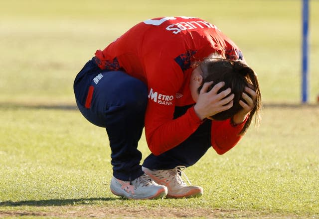 England’s Mady Villiers holds her head in her hands after missing with a potential catch as Ireland defeated England in the Women’s International T20 match at Castle Avenue, Dublin. 