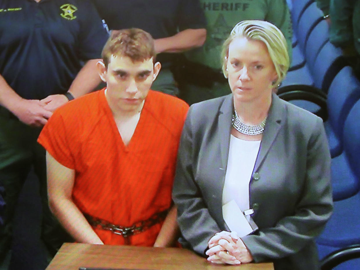 Nikolas Cruz appears via video monitor with his public defender Melisa McNeill at a bond court hearing in Fort Lauderdale, Florida: Reuters