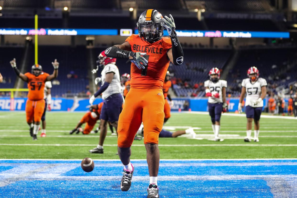 Belleville running back Jeremiah Beasley celebrates a touchdown against Southfield A&T during the second half of the Division 1 state final at Ford Field in Detroit on Sunday, Nov. 26, 2023.