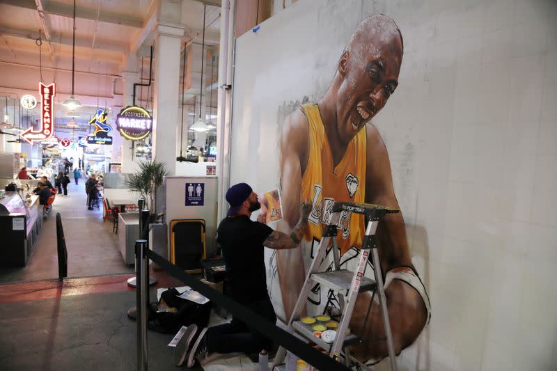 Muralist Jonas Never paints a portrait of late retired basketball player Kobe Bryant in Los Angeles