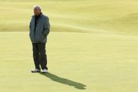 <p>Arnold Palmer of the United States stands on the 18th green during the Champion Golfers’ Challenge ahead of the 144th Open Championship at The Old Course on July 15, 2015 in St Andrews, Scotland. (Photo by Mike Ehrmann/Getty Images) </p>