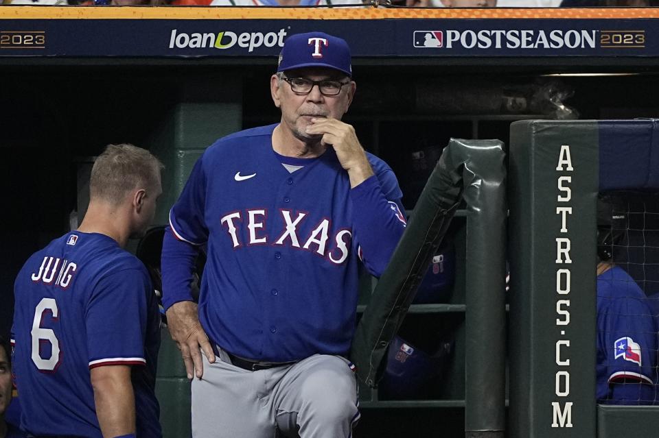 Texas Rangers manager Bruce Bochy watches during the fifth inning of Game 1 of the baseball AL Championship Series against the Houston Astros Sunday, Oct. 15, 2023, in Houston. (AP Photo/David J. Phillip)