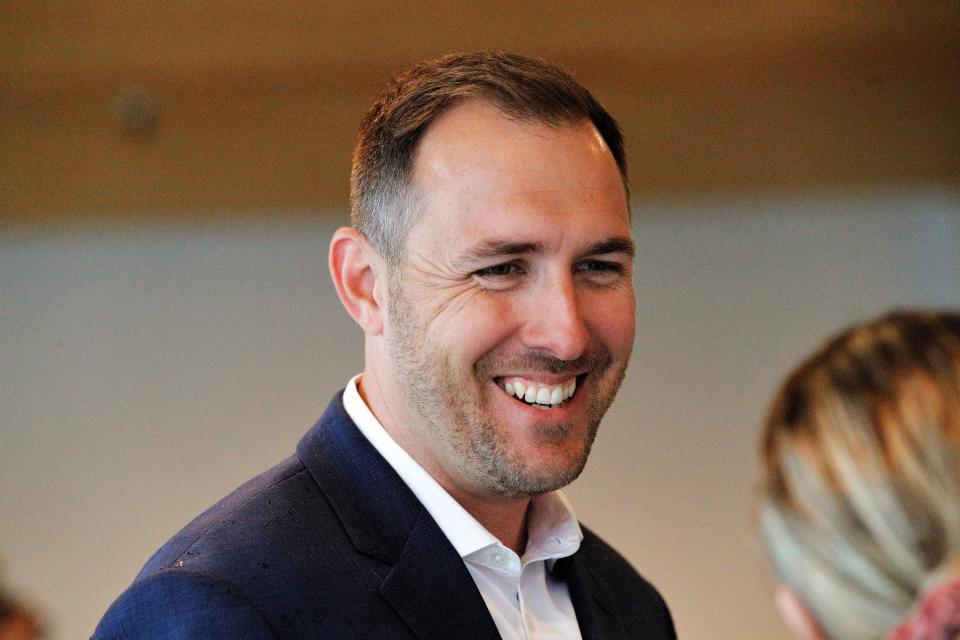 Joshua Johnson talks to guests on March 15 as he publicly announced his candidacy for Redding City Council.