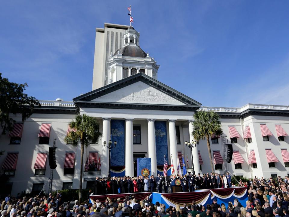 Officials stand on stage during an inauguration ceremony where Ron DeSantis was sworn in as Florida Governor, Tuesday, January 8, 2019, in Tallahassee, Florida.