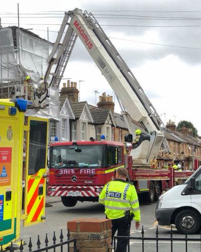 Emergency services at the property in Windsor after the upper storey collapsed.