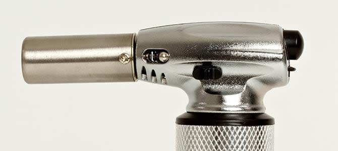 An example of a butane lighter, which can be locked to provide a continuous flame. The City of Vancouver has banned its retail sale starting June 28 to try to curb the number of fires related to their use. (City of Vancouver - image credit)
