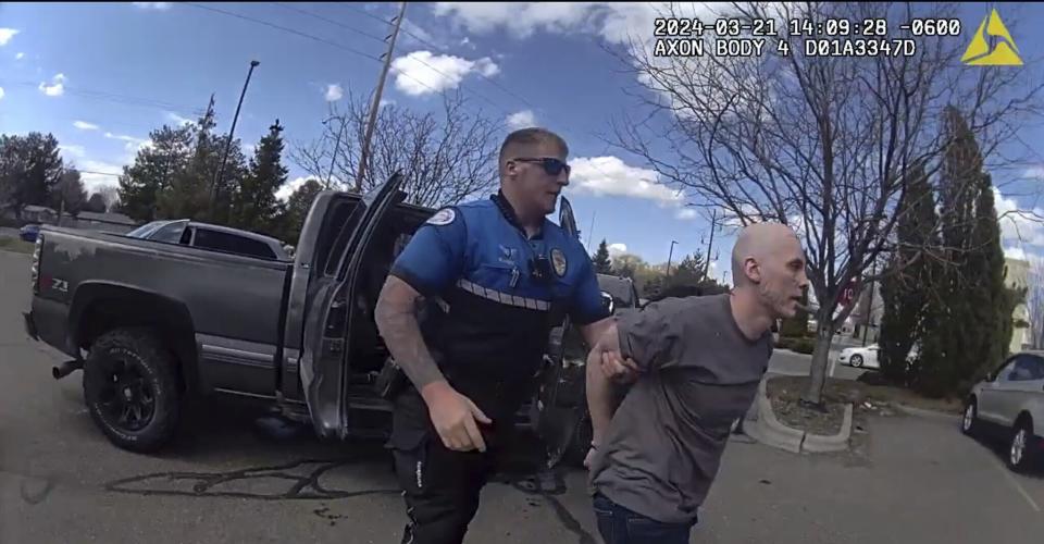 In this photo made from body camera footage and released by the Twin Falls, Idaho, Police Department, Skylar Meade, right, is arrested in Twin Falls on Thursday, March 21, 2024. Police said Meade, an Idaho prison inmate, escaped from custody when an accomplice ambushed corrections officers who were preparing to transport him back to prison from a hospital in Boise on Wednesday, March 20. Authorities say Meade and his accomplice, Nicholas Umphenour, may have been responsible for the killings of two men in northern Idaho while on the run. (Twin Falls Police Department via AP)