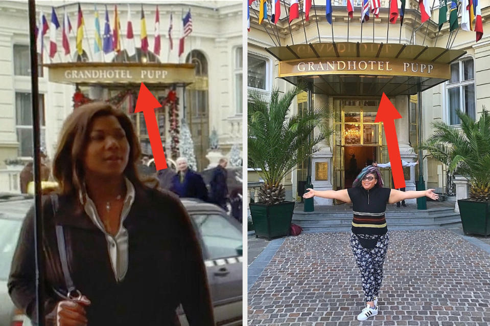 Queen Latifah is on the left walking through a door with a woman and her arms stretched out on the right