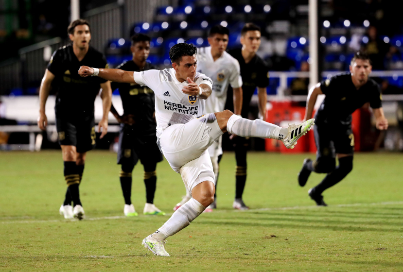 Galaxy forward Cristian Pavon scores against LAFC during a match on July 18.