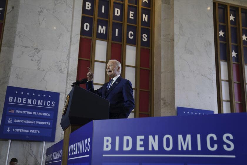 FILE - President Joe Biden delivers remarks on the economy, Wednesday, June 28, 2023, at the Old Post Office in Chicago. Biden has long struggled to neatly summarize his sprawling economic vision. On Wednesday, the president gave a speech on "Bidenomics" in the hopes that the term will lodge in voters' brains ahead of the 2024 elections. But what is Bidenomics? Let's just say the White House definition is different from the Republican one — evidence that catchphrases can be double-edged. (AP Photo/Evan Vucci, File)