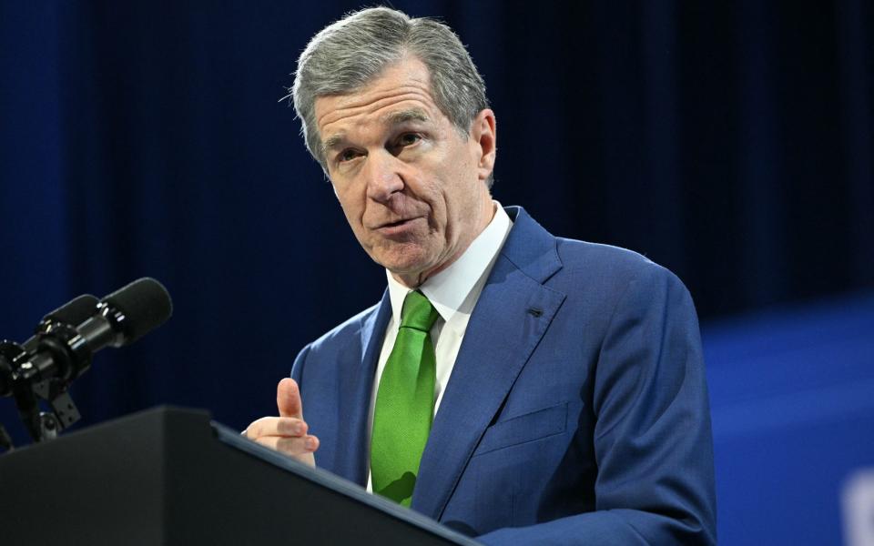 Roy Cooper, the North Carolina governor,  warned against 'criminal charges for people who want to protect their health'