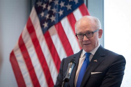 FILE PHOTO: United States ambassador to the Court of St James Woody Johnson speaks during a press preview at the new United States embassy building near the River Thames in London, Britain, December 13, 2017. Stefan Rousseau/Pool via REUTERS/File Photo