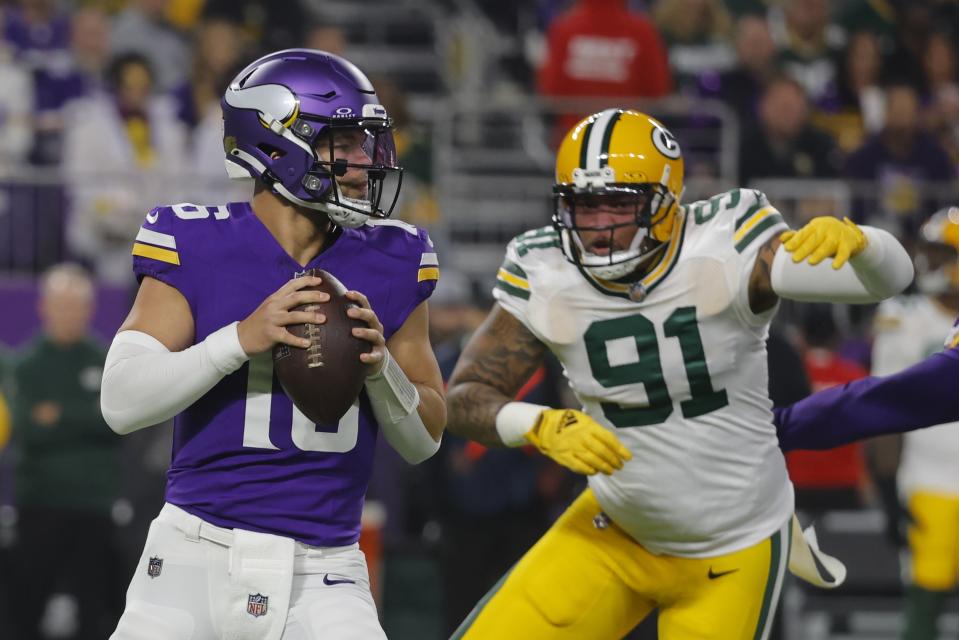 Minnesota Vikings' Jaren Hall drops back during the first half of an NFL football game against the Green Bay Packers Sunday, Dec. 31, 2023, in Minneapolis. (AP Photo/Bruce Kluckhohn)