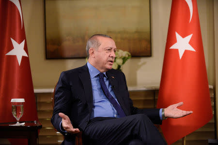 Turkish President Tayyip Erdogan gestures during an interview with Reuters Editor-in-Chief Steve Adler and Reuters Chief Correspondent Parisa Hafezi at The Peninsula hotel on the sidelines of the United Nations General Assembly in Manhattan, New York, U.S. September 21, 2017. REUTERS/Darren Ornitz/Files