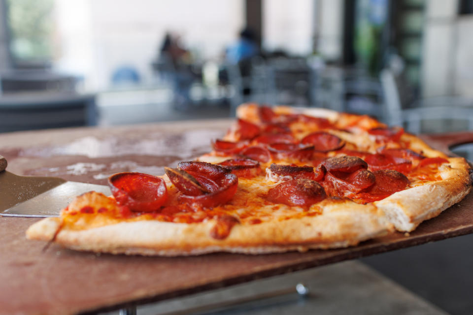 Close-up of a pizza slice with pepperoni