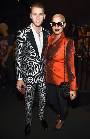 <p>Michael Buckner/Penske Media via Getty </p> Machine Gun Kelly and Amber Rose