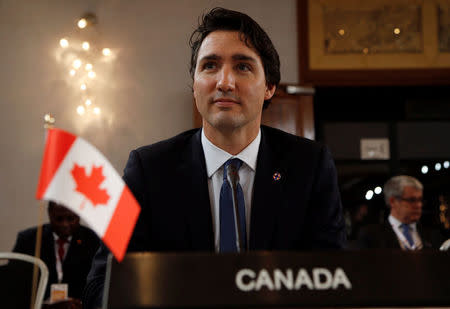 FILE PHOTO: Canada's Prime Minister Justin Trudeau looks on at the start of the Climate Action Special Executive Session at the Commonwealth Heads of Government Meeting (CHOGM) in Valletta, Malta, November 27, 2015. REUTERS/Darrin Zammit Lupi