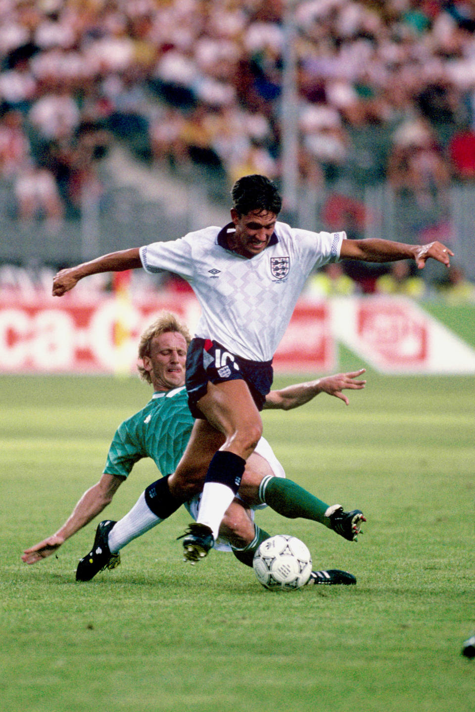 England's Gary Lineker (r) tries to get away from West Germany's Andreas Brehme (l)  (Photo by Peter Robinson - PA Images via Getty Images)