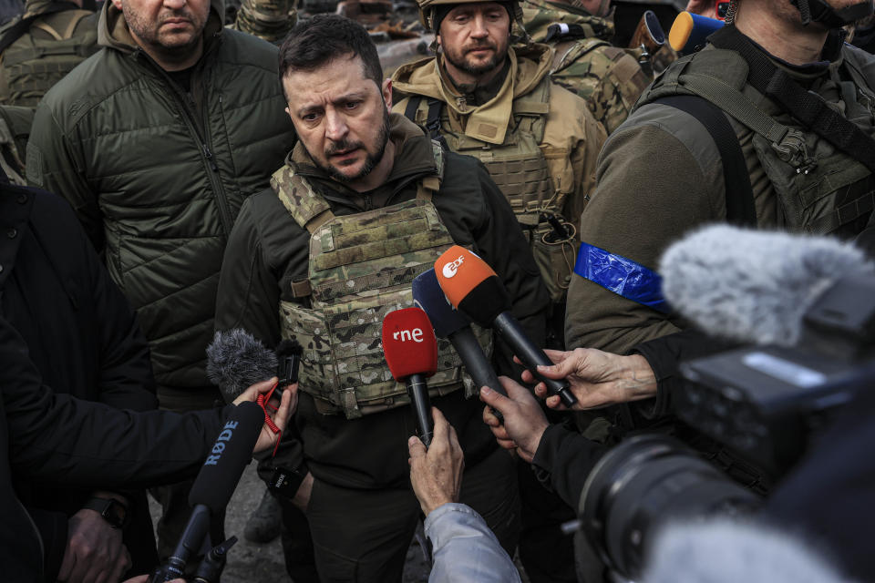 Ukrainian President Volodymyr Zelensky speaks to reporters in Bucha, Ukraine, Monday. (Metin Aktas/Anadolu Agency via Getty Images)