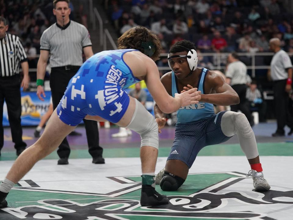 Ossining's Tristan Robinson-July wrestles a quarterfinal match at the NYSPHSAA Wrestling Championships at MVP Arena in Albany, on Friday, February 24, 2023.