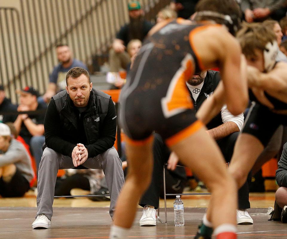 Ashland head coach Sean Seder watches Roman Parobek during their 126lb match at the JC Gorman Wrestling Tournament Saturday, Jan. 7, 2023. TOM E. PUSKAR/ASHLAND TIMES-GAZETTE