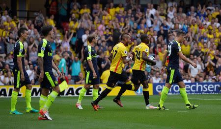 Football Soccer Britain - Watford v Arsenal - Premier League - Vicarage Road - 27/8/16 Watford's Roberto Pereyra celebrates scoring their first goal with Odion Ighalo Reuters / Hannah McKay Livepic