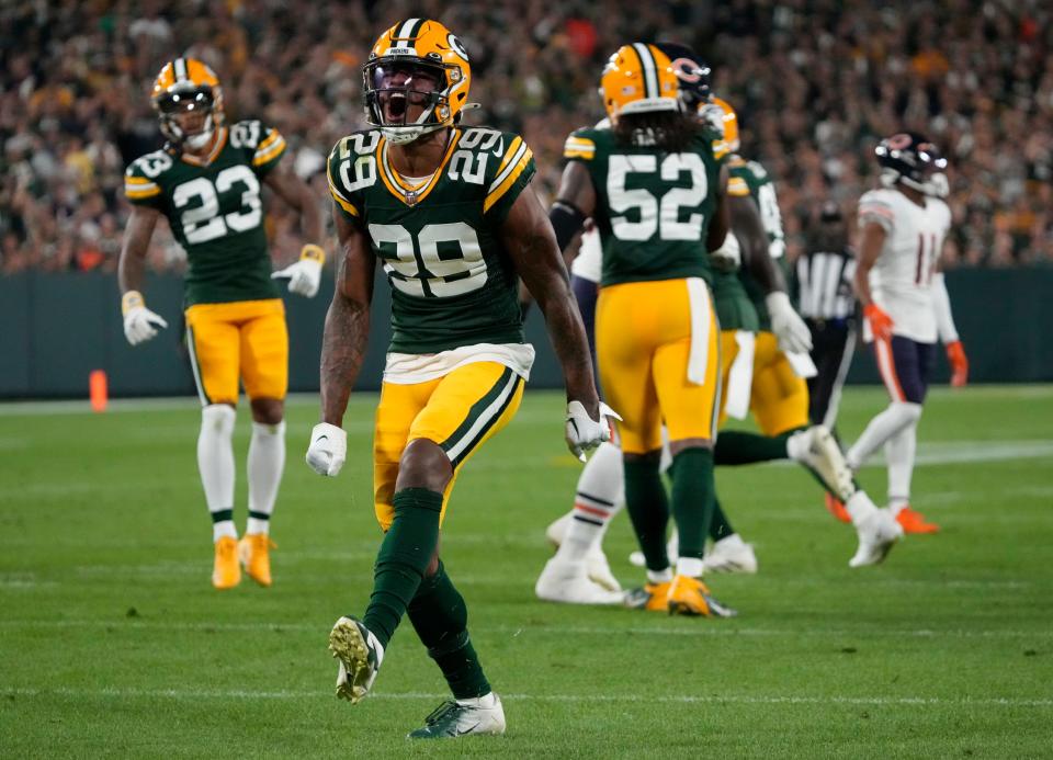 Green Bay Packers cornerback Rasul Douglas (29) celebrates a tackle for a stop on third down during the second quarter of their game against the Chicago Bears on Sunday, Sept. 18, 2022 at Lambeau Field in Green Bay.  