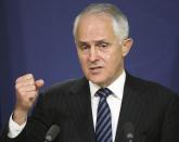 FILE - In this Aug. 10, 2016, file photo, Australian Prime Minister Malcolm Turnbull speaks in Sydney. Several countries say they hope to salvage the Trans-Pacific Partnership after President Donald Trump's decision on a U.S. withdrawal from the trade pact cast its future in jeopardy. Turnbull on Tuesday, Jan. 24, 2017 said Trump's move was a blow to the multinational agreement. But he suggested other nations, such as China, may be able to fill the void left by the U.S. (AP Photo/Rick Rycroft, File)