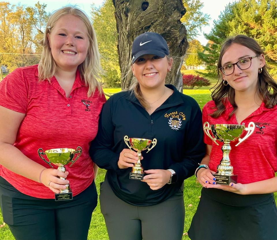 Julie Saylor of Honesdale (right) earned first place in the girls bracket at this year's Wayne County Commissioners Cup. Honesdale's Delaney Rowe (left) and Aby Plevyak of Forest City finished second and third respectively.