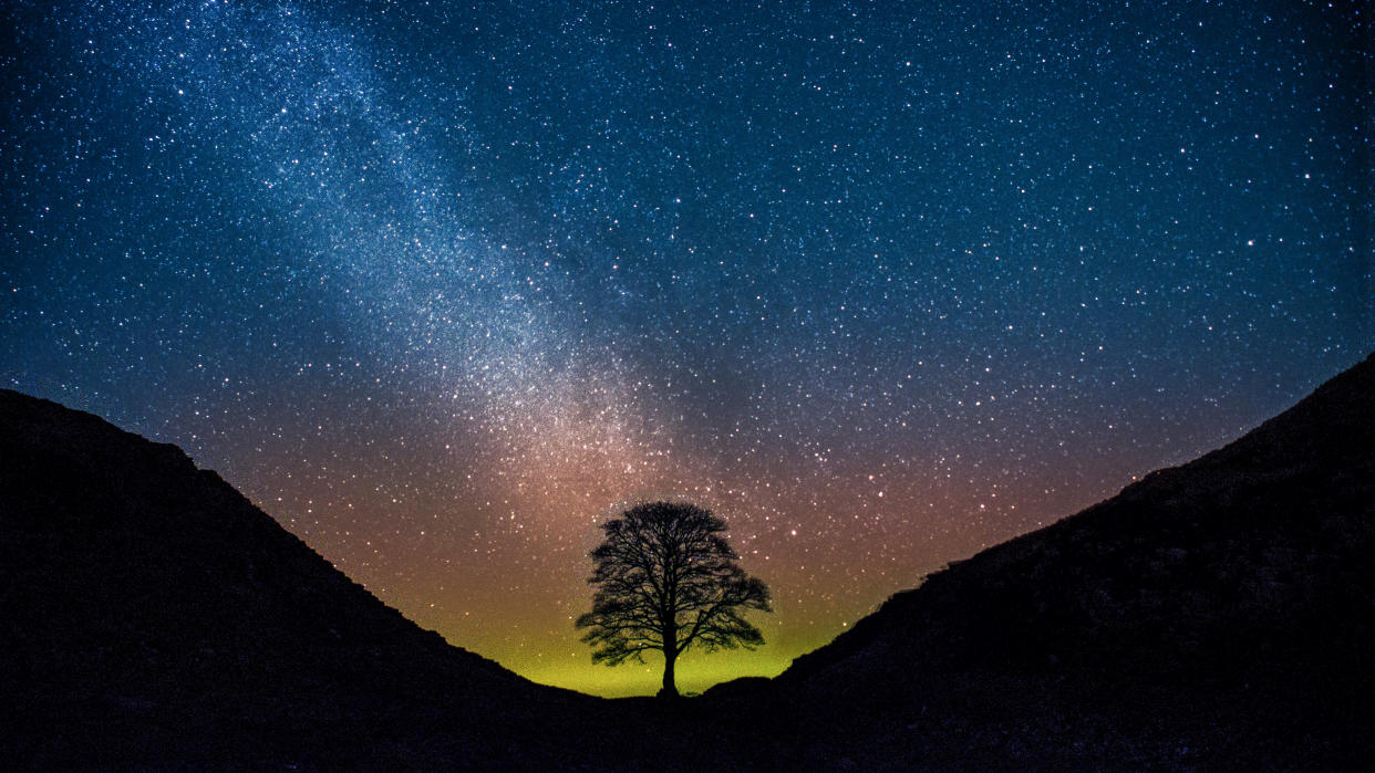 The Remnants Of An Aurora Over Sycamore Gap, Hadrian's Wall, UK. 