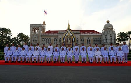 Thailand's Prime Minister Prayuth Chan-ocha and new government cabinet pose for a photo in Bangkok