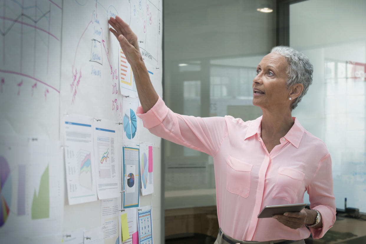 Working longer can help stave off withdrawals from retirement accounts, let you add to accounts, and delay Social Security benefits to take advantage of a roughly 8% annual bump if you wait from full retirement age to age 70. (Getty Creative)
