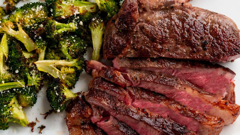 rare steak and broccoli