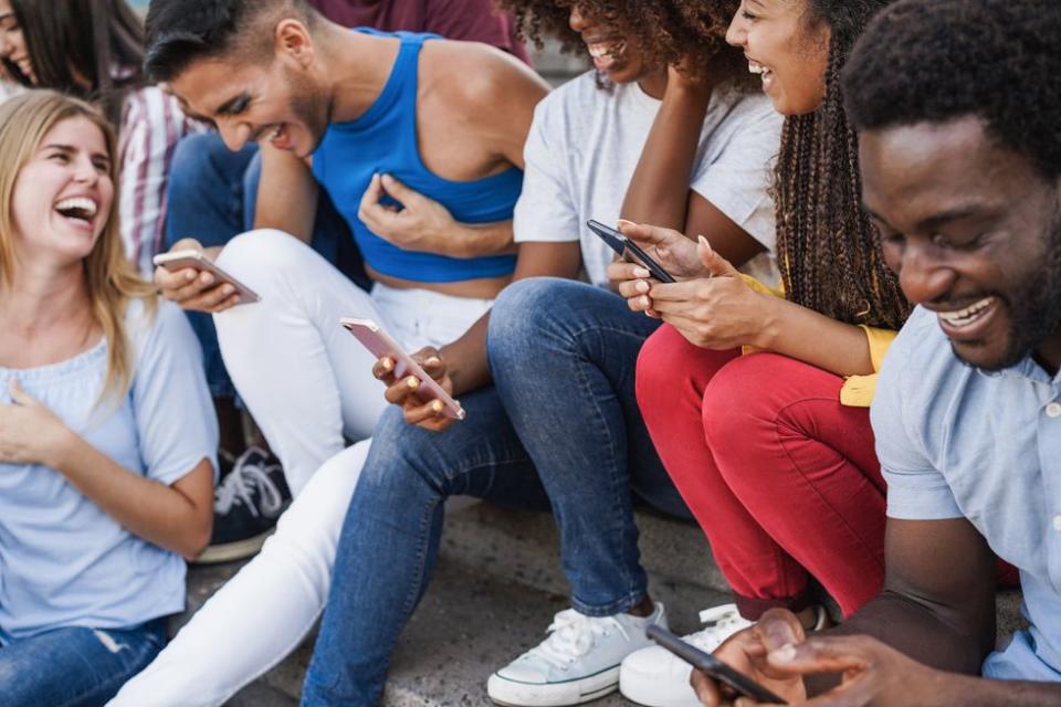 group of people on their phones