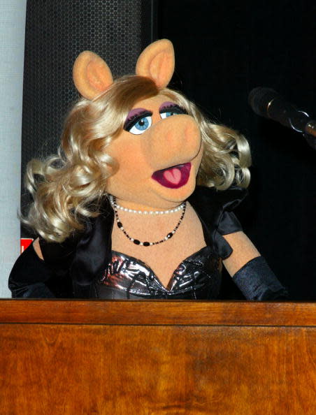 Miss Piggy accepts an award on behalf of Diana Ross at the We Are Family Benefit Concert & Awards at The China Club in New York City in 2003.