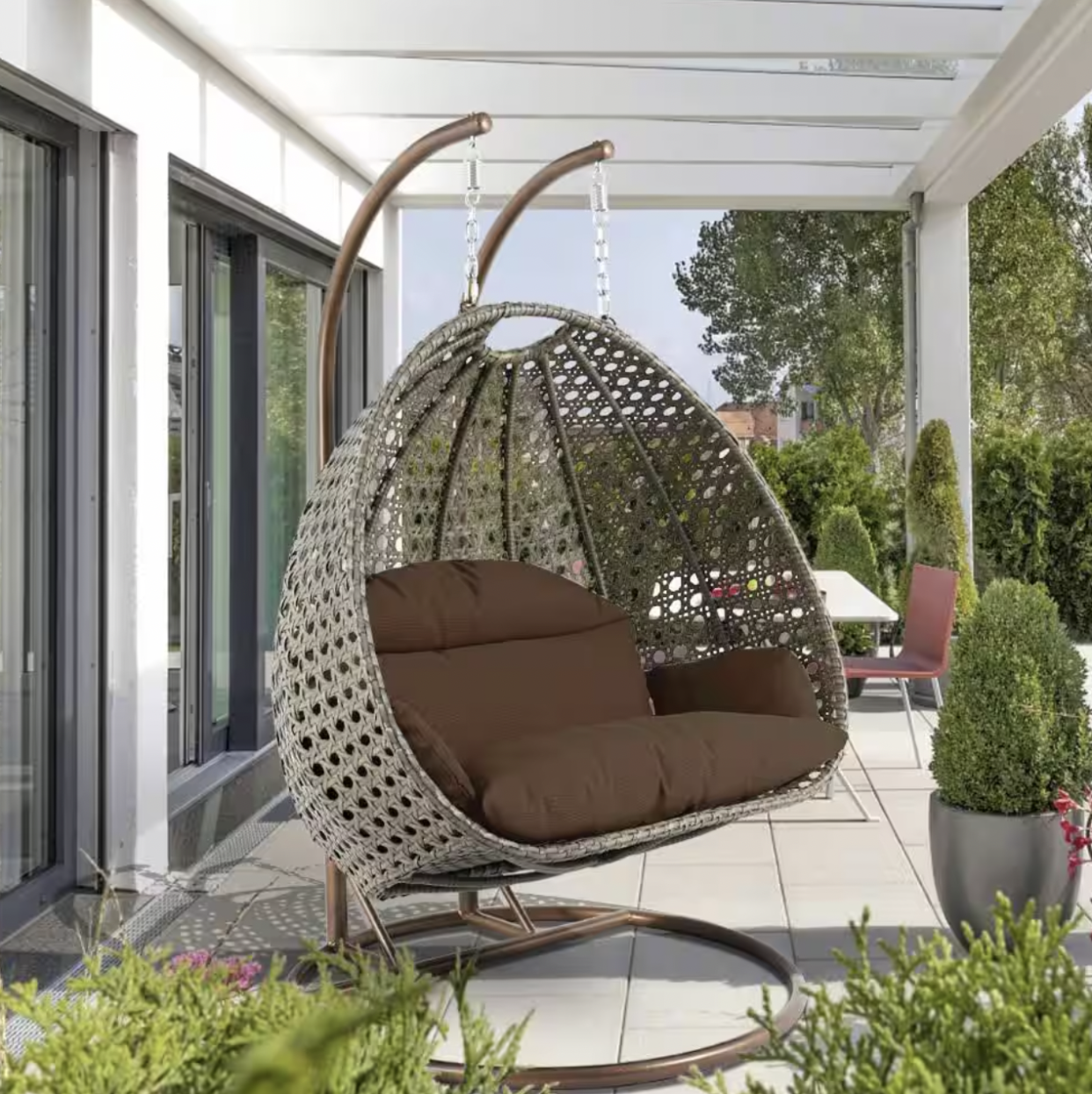 <p><a href="https://go.redirectingat.com?id=74968X1596630&url=https%3A%2F%2Fwww.homedepot.com%2Fp%2FLeisuremod-Beige-Wicker-Hanging-2-Person-Egg-Swing-Chair-Porch-Swing-with-Brown-Cushions-ESCBG-57BR%2F327696255&sref=https%3A%2F%2Fwww.thepioneerwoman.com%2Fhome-lifestyle%2Fdecorating-ideas%2Fg39432199%2Fbest-outdoor-hanging-egg-chair%2F" rel="nofollow noopener" target="_blank" data-ylk="slk:Shop Now;elm:context_link;itc:0;sec:content-canvas" class="link rapid-noclick-resp">Shop Now</a></p><p>Two Person Egg Swing Chair </p><p>homedepot.com</p><p>$840.78</p><span class="copyright">Home Depot</span>