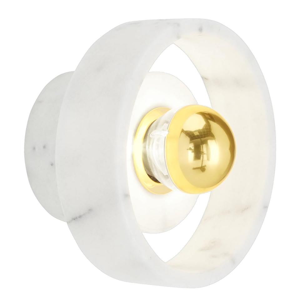 <p>Inspired by another luxurious home essential, the ‘Stone’ spice grinder by Tom Dixon, this light carved from white Morwad marble has a natural beauty that transcends trends. Added bonus: it’s IP44-rated, so can even be used in bathrooms and kitchens. £270, <a href="https://www.tomdixon.net/en_gb/stone-wall.html" rel="nofollow noopener" target="_blank" data-ylk="slk:tomdixon.net;elm:context_link;itc:0;sec:content-canvas" class="link ">tomdixon.net</a></p>