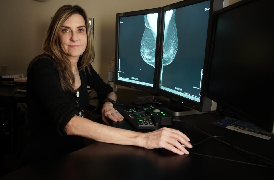 Dr. Jacqueline Holt, a radiologist and director of breast imaging at the Helen F. Graham Cancer Center & Research Institute, reads the 3-D imaging from a tomosynthesis mammography machine made by Hologic, a pioneer in the rapidly advancing technology.