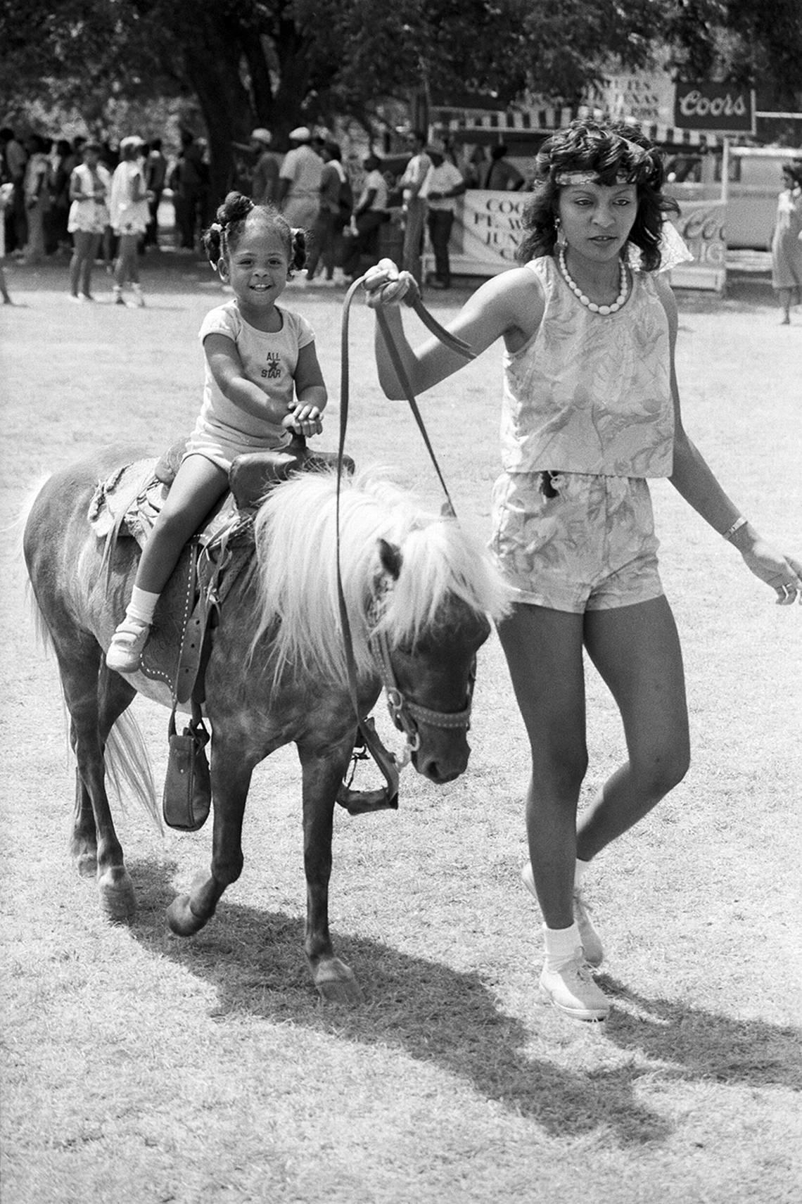 A child rides a miniature pony during Juneteenth festivities at Sycamore Park in Fort Worth in 1985.